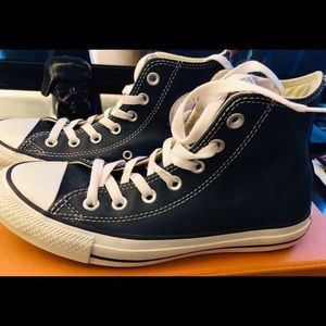 Navy blue and white Converse